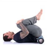 Om Roller 5-inch with Indigo cover in sacrum rolling position