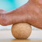 eco cork acupressure ball used with foot
